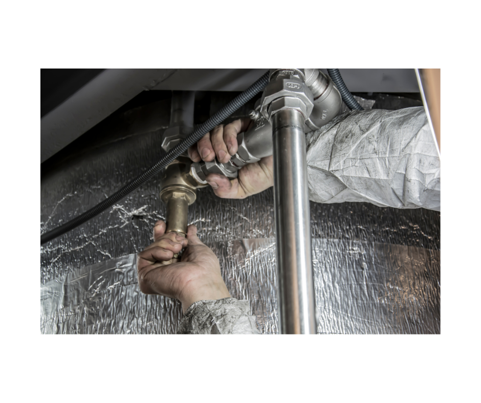 Restoration technician assessing water damage on Long Island